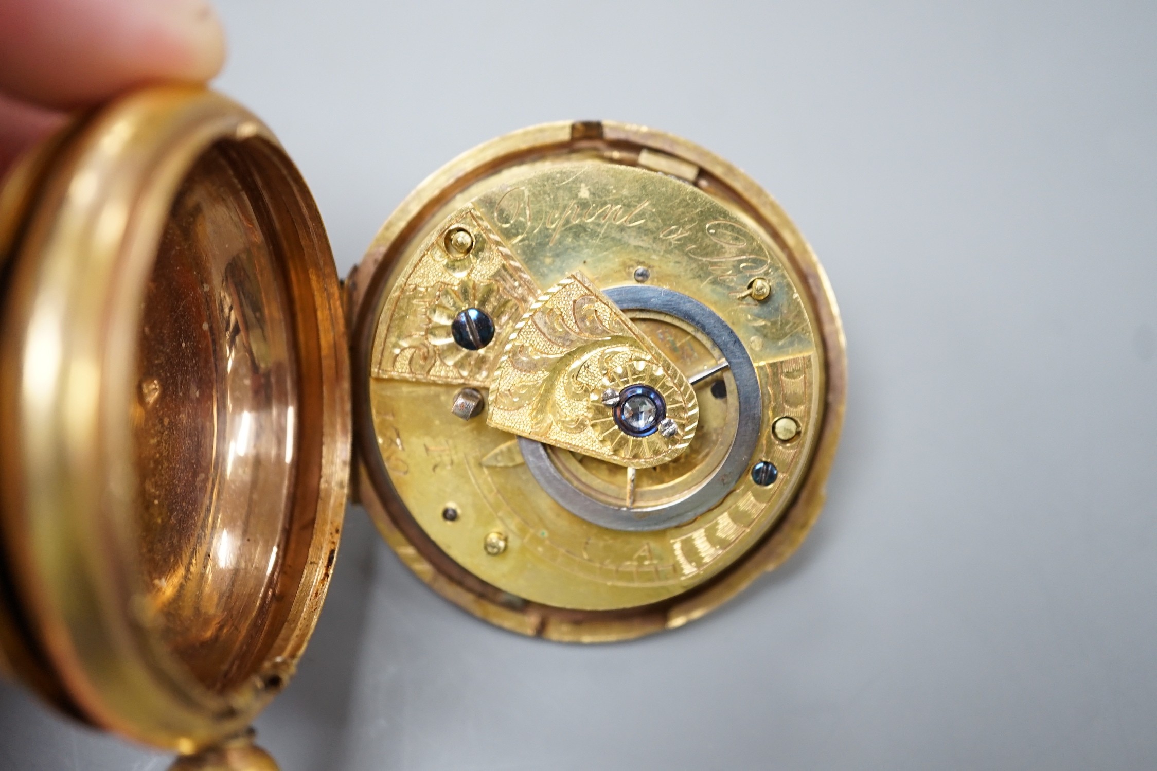 An early 19th century gilt metal verge pocket watch (a.f.).